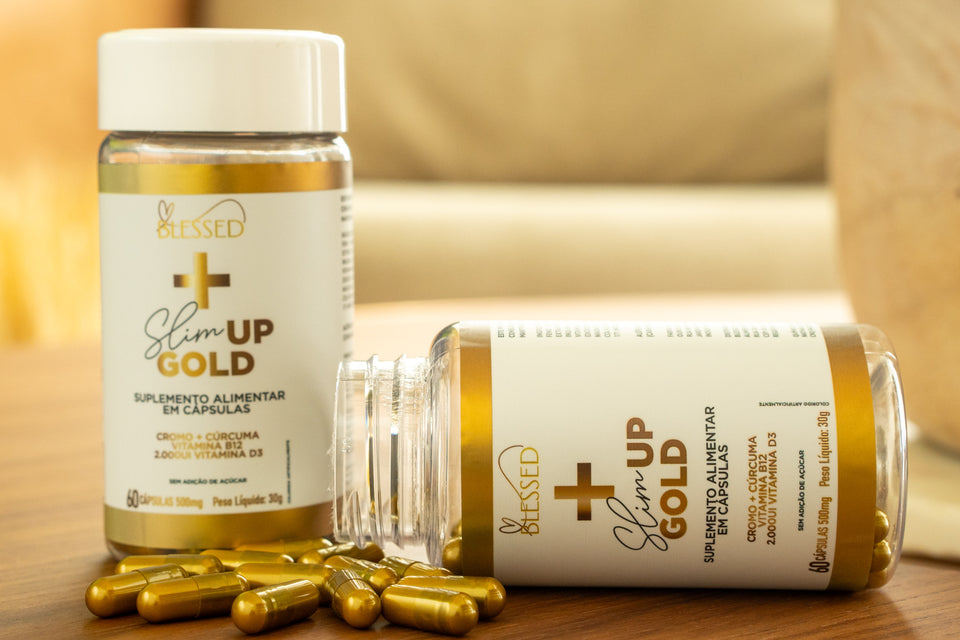 Dois potes de Slim Up Gold com cápsulas douradas sobre a mesa